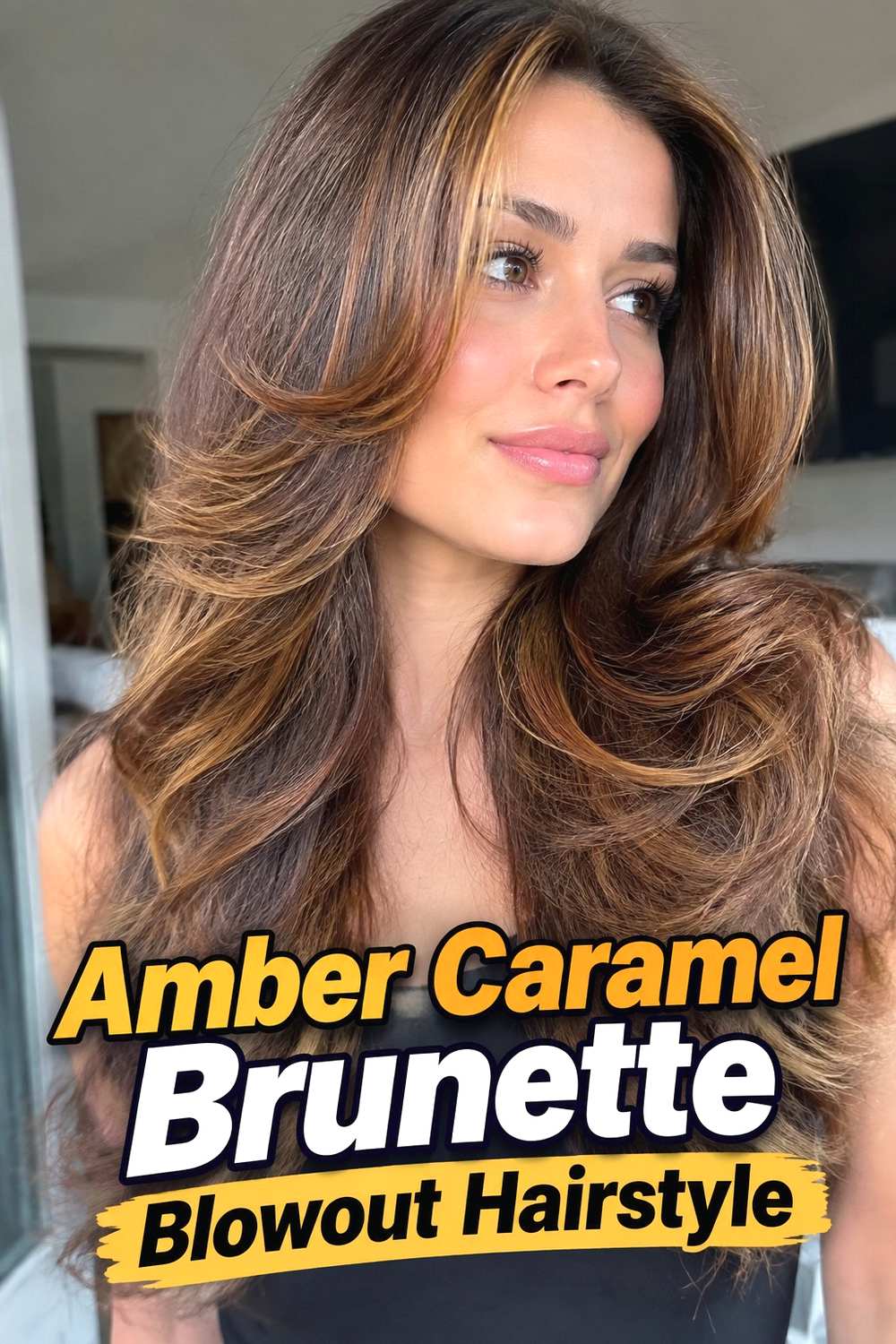13. Amber Caramel Brunette Blowout Hairstyle