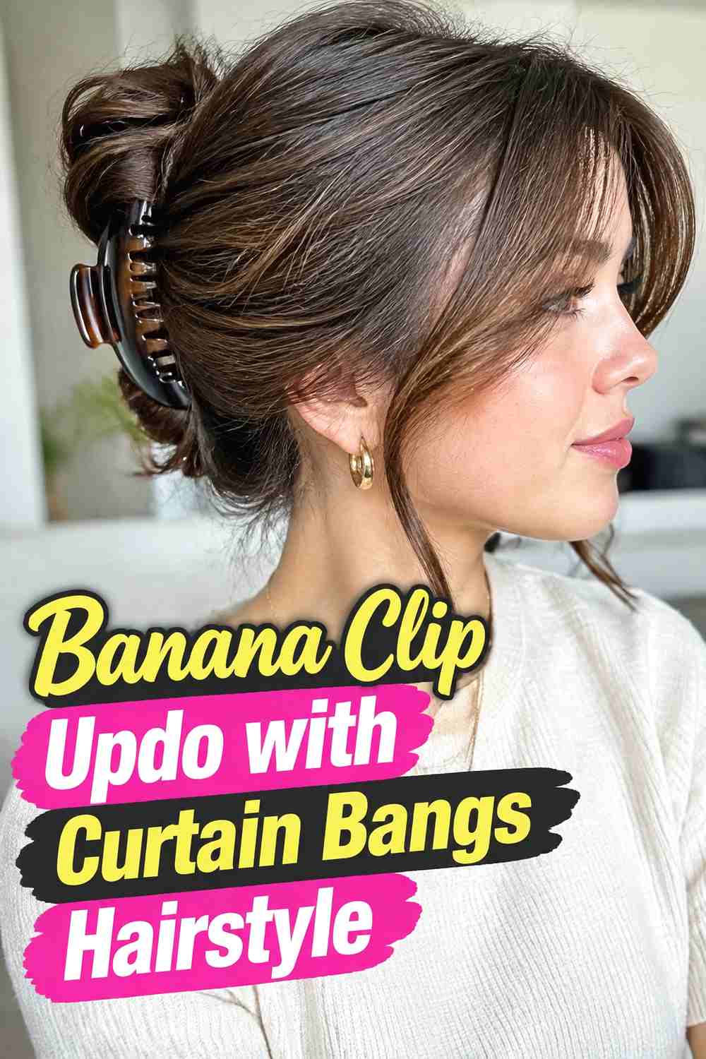 7. Banana Clip Updo With Curtain Bangs Hairstyle