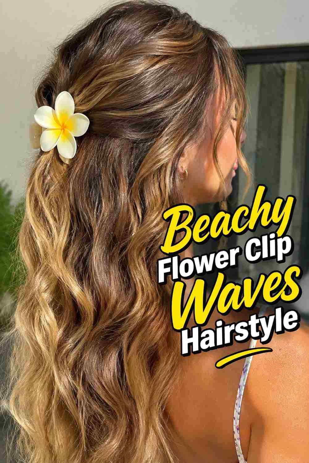 7. Beachy Flower Clip Waves Hairstyle
