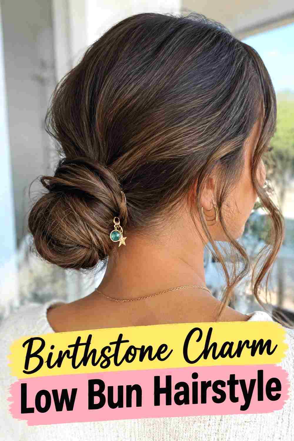 2. Birthstone Charm Low Bun Hairstyle