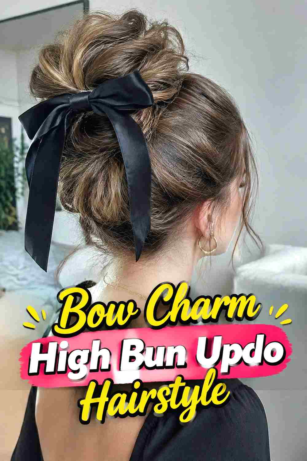 9. Bow Charm High Bun Updo Hairstyle