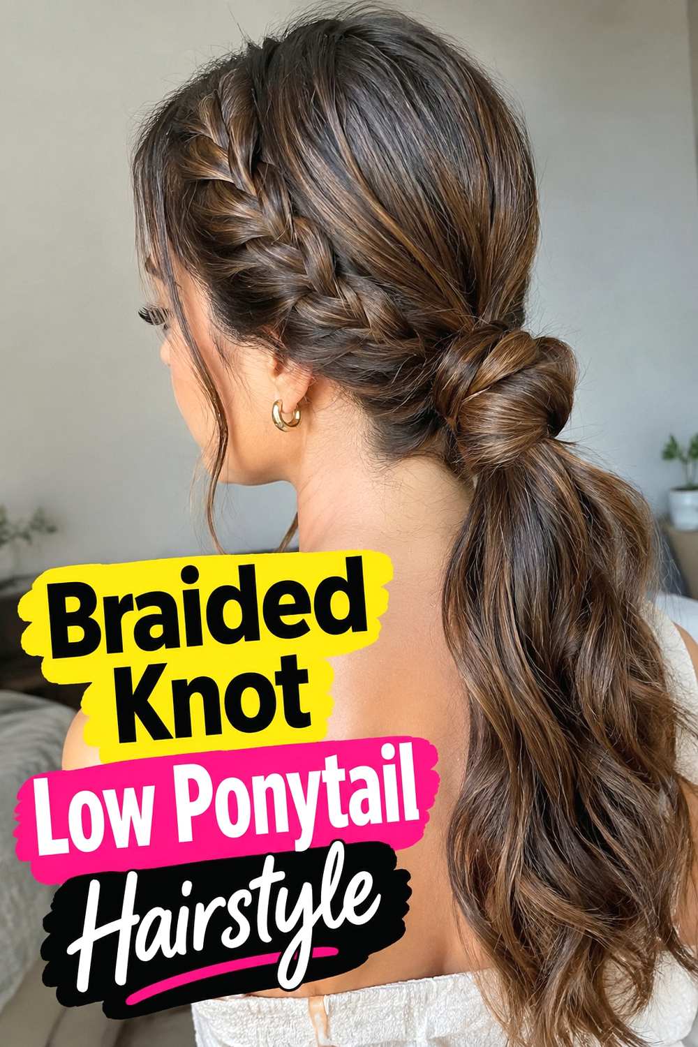 6. Braided Knot Low Ponytail Hairstyle