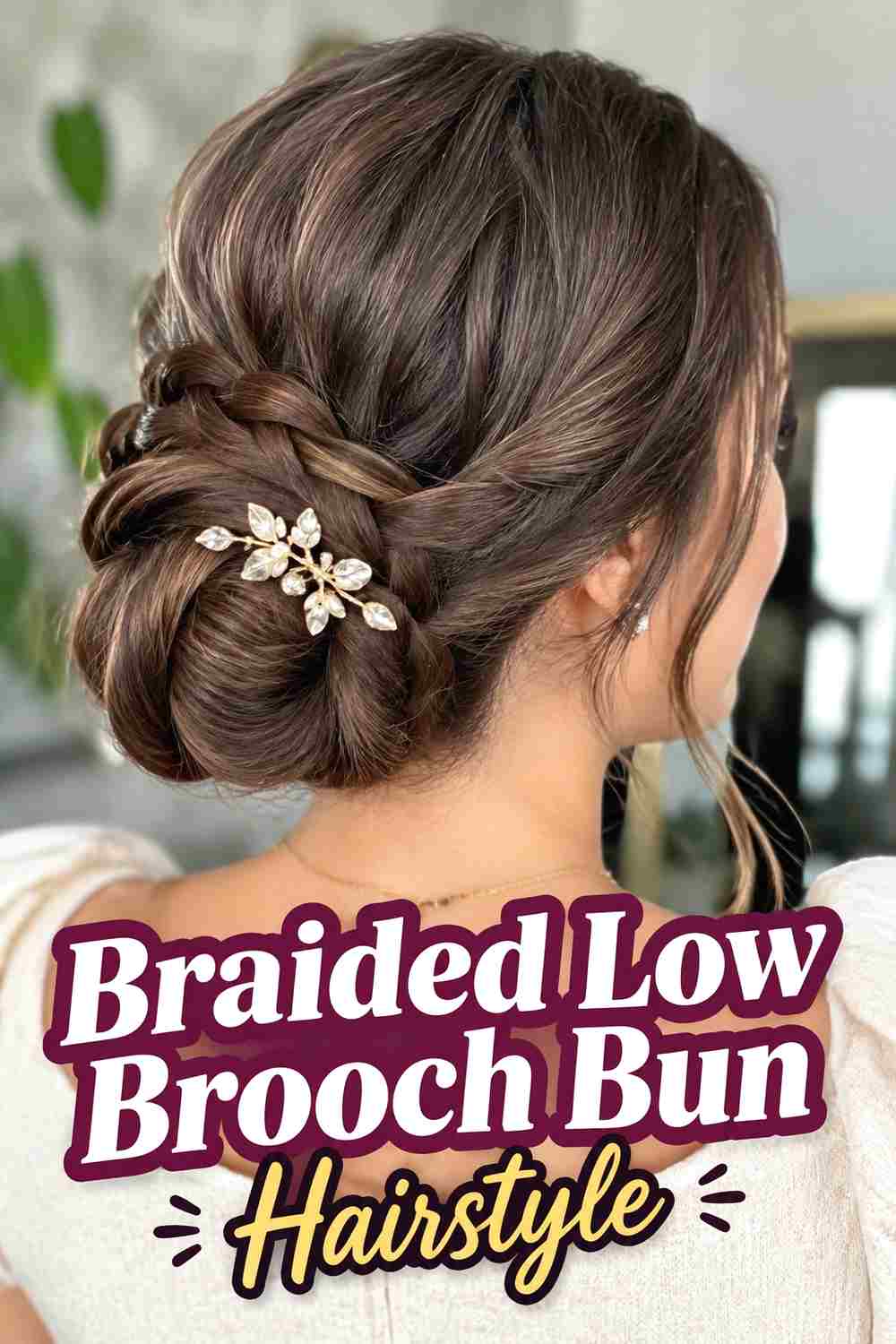 5. Braided Low Brooch Bun Hairstyle