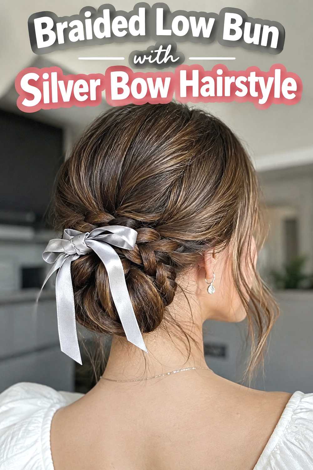 3. Braided Low Bun With Silver Bow Hairstyle