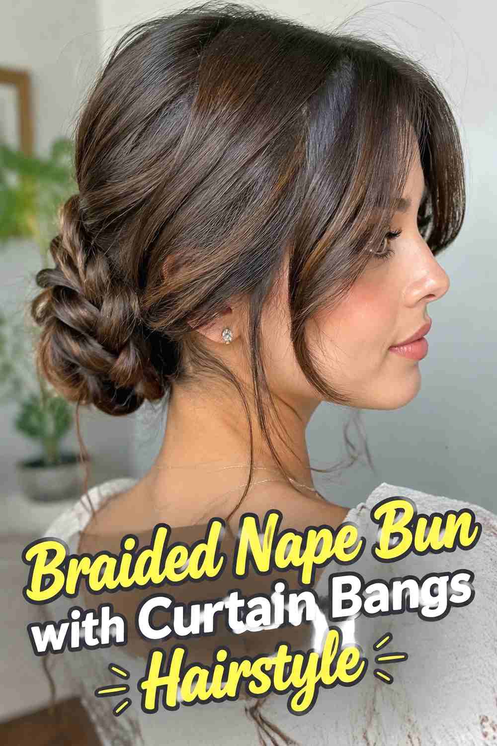 10. Braided Nape Bun With Curtain Bangs Hairstyle