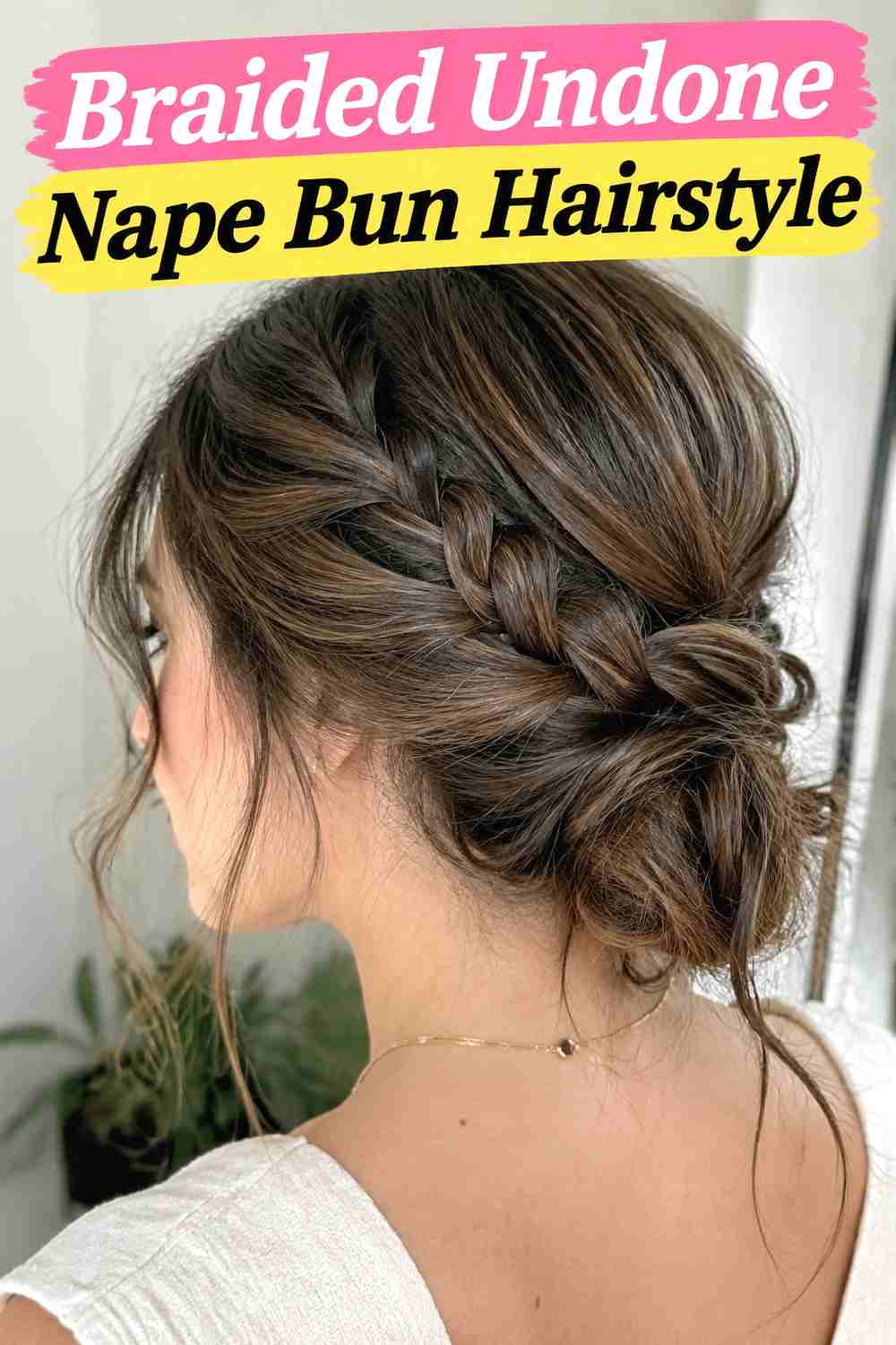 7. Braided Undone Nape Bun Hairstyle