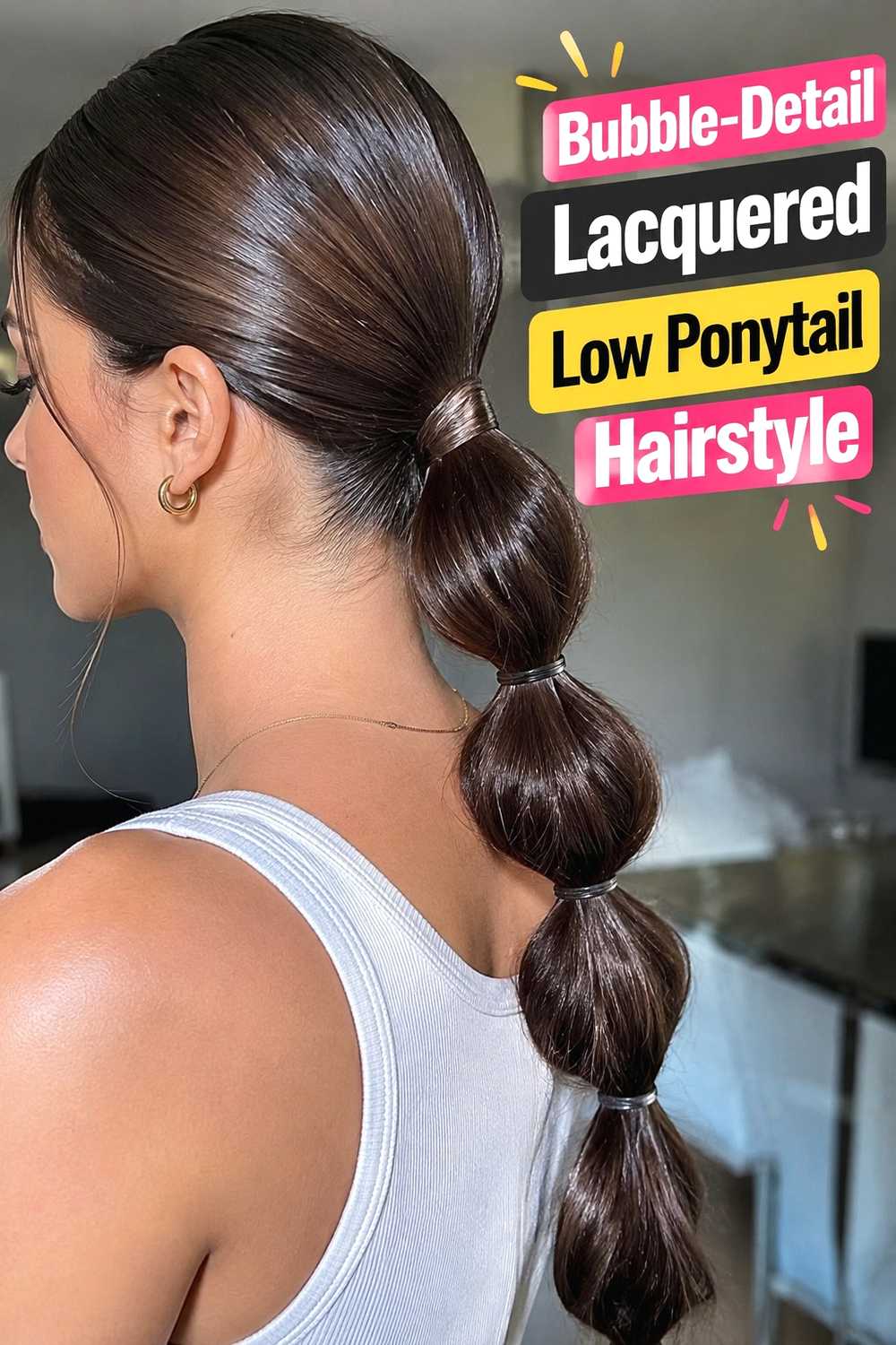 7. Bubble Detail Lacquered Low Ponytail Hairstyle