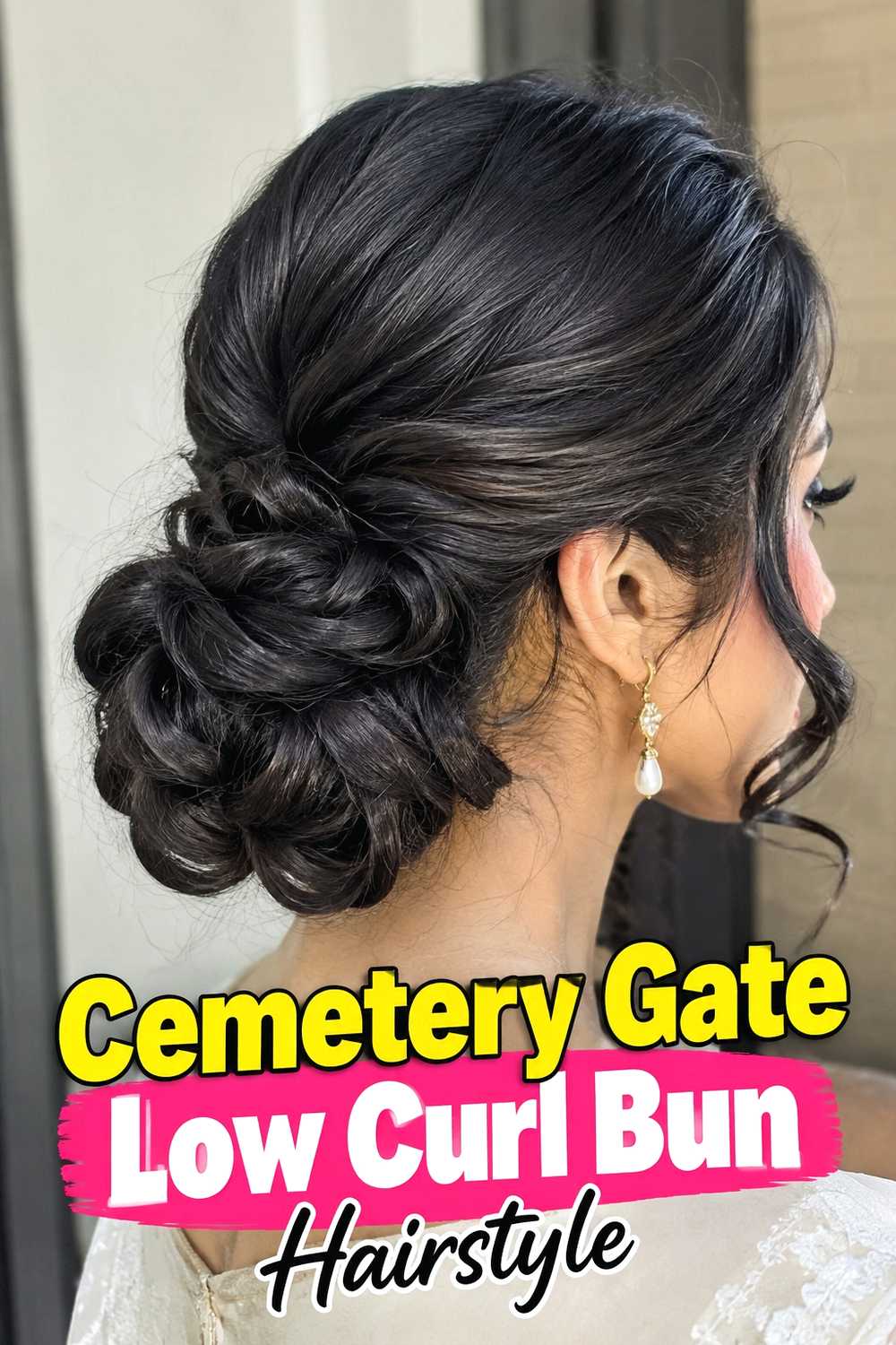 11. Cemetery Gate Low Curl Bun Hairstyle