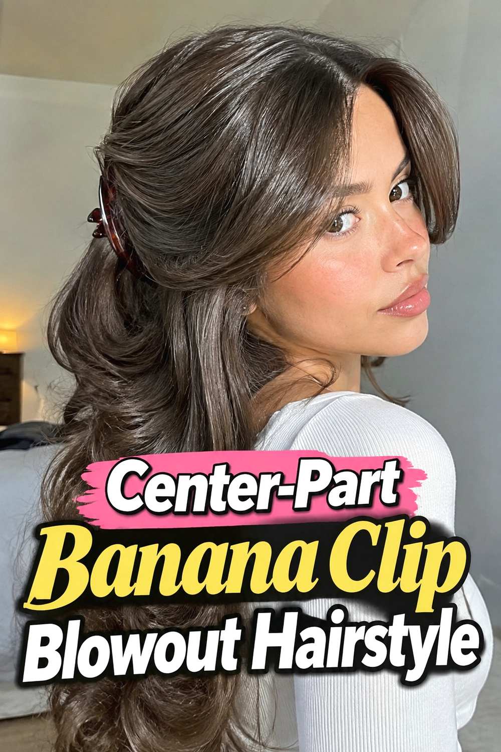 13. Center Part Banana Clip Blowout Hairstyle