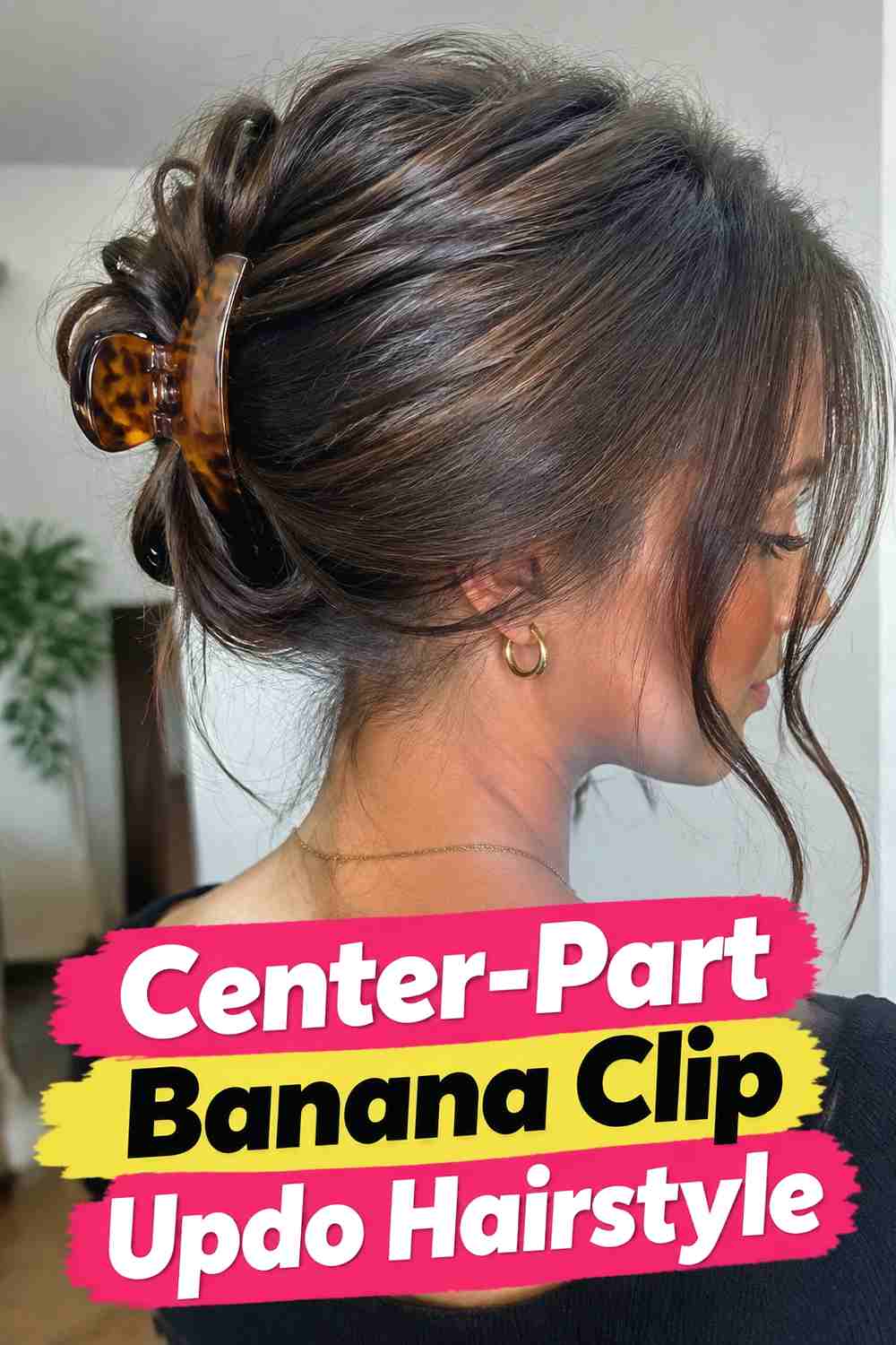 15. Center Part Banana Clip Updo Hairstyle