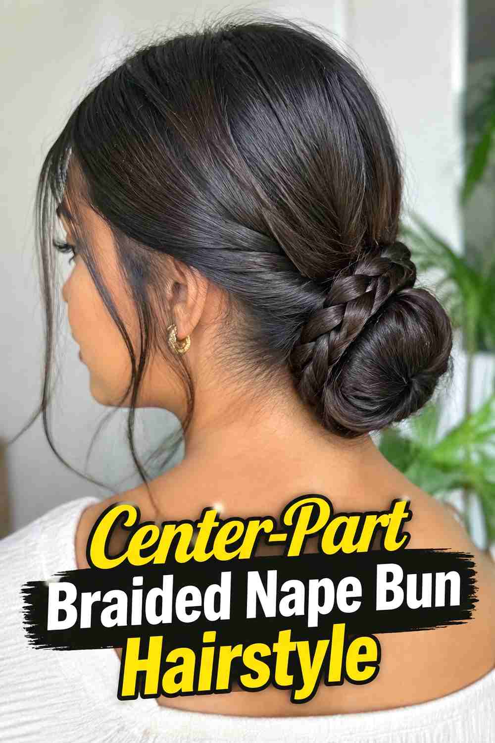 2. Center Part Braided Nape Bun Hairstyle