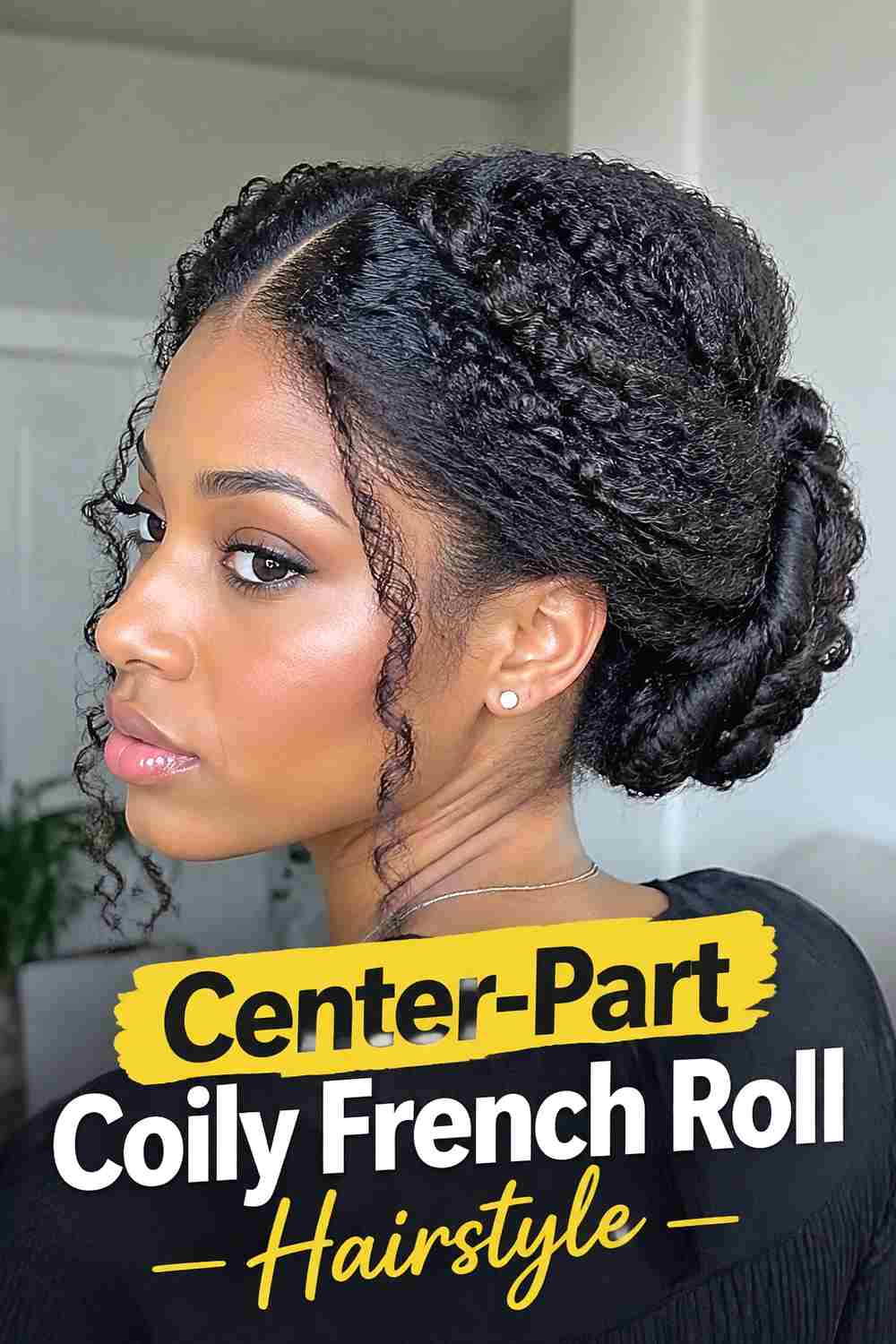 3. Center Part Coily French Roll Hairstyle