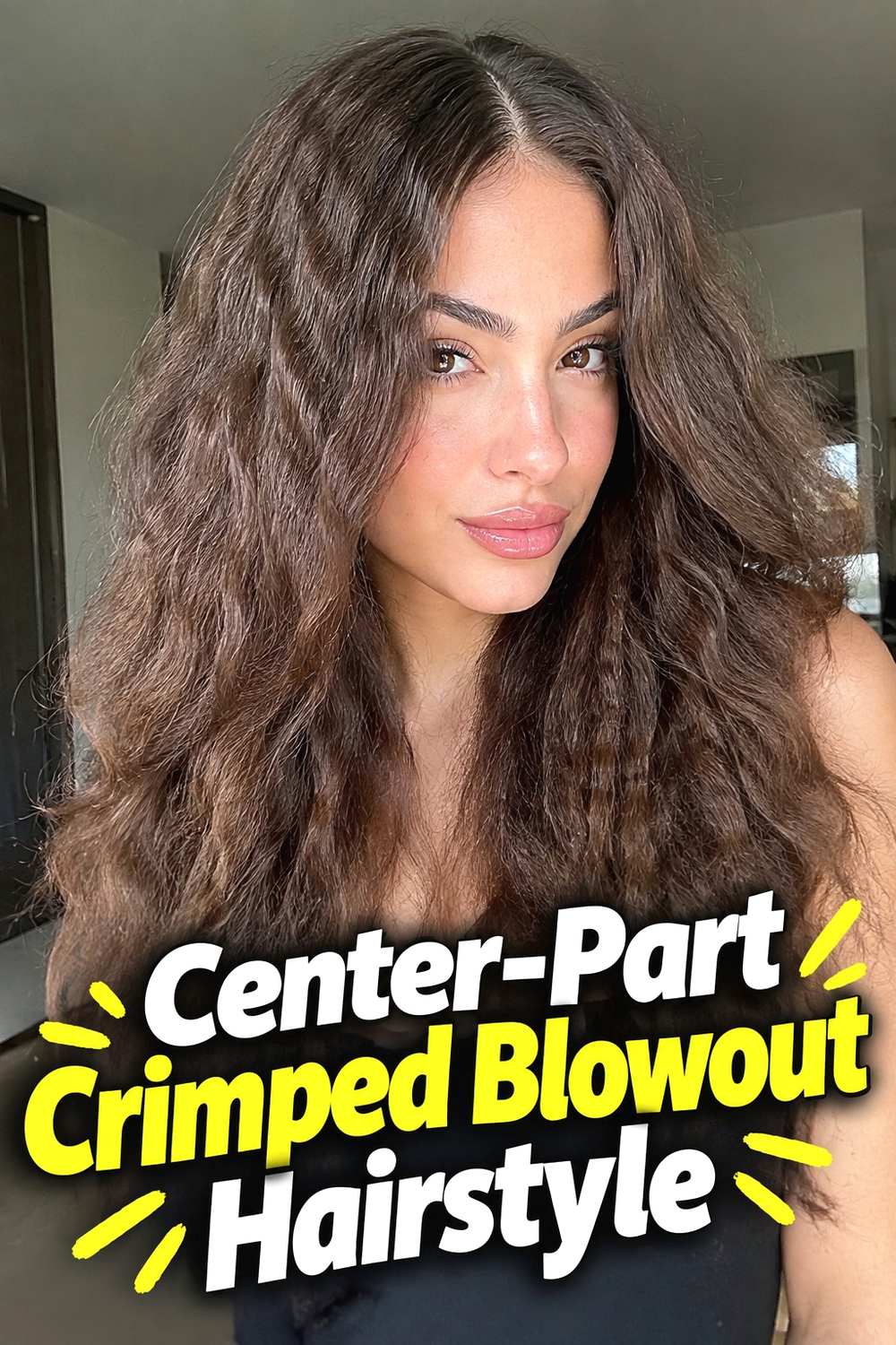 5. Center Part Crimped Blowout Hairstyle