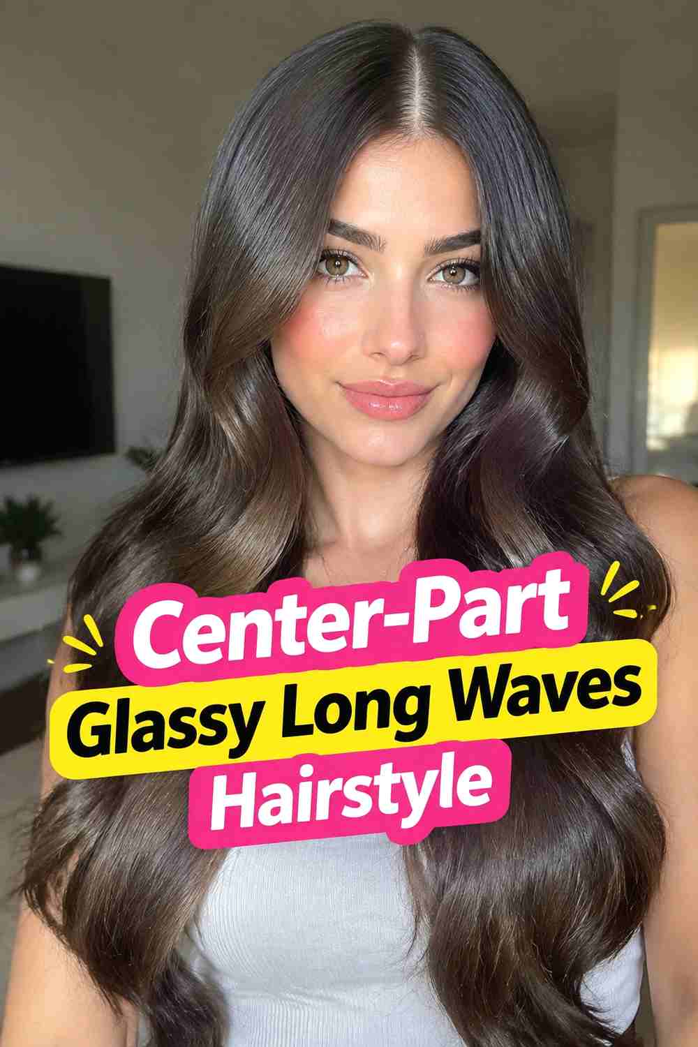 2. Center Part Glassy Long Waves Hairstyle