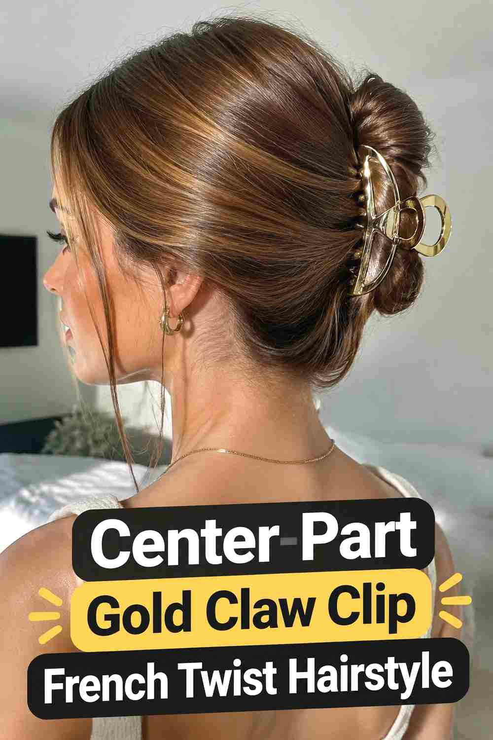5. Center Part Gold Claw Clip French Twist Hairstyle