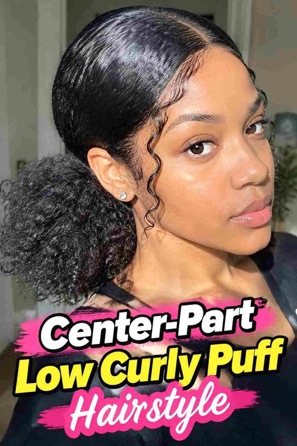 2. Center Part Low Curly Puff Hairstyle