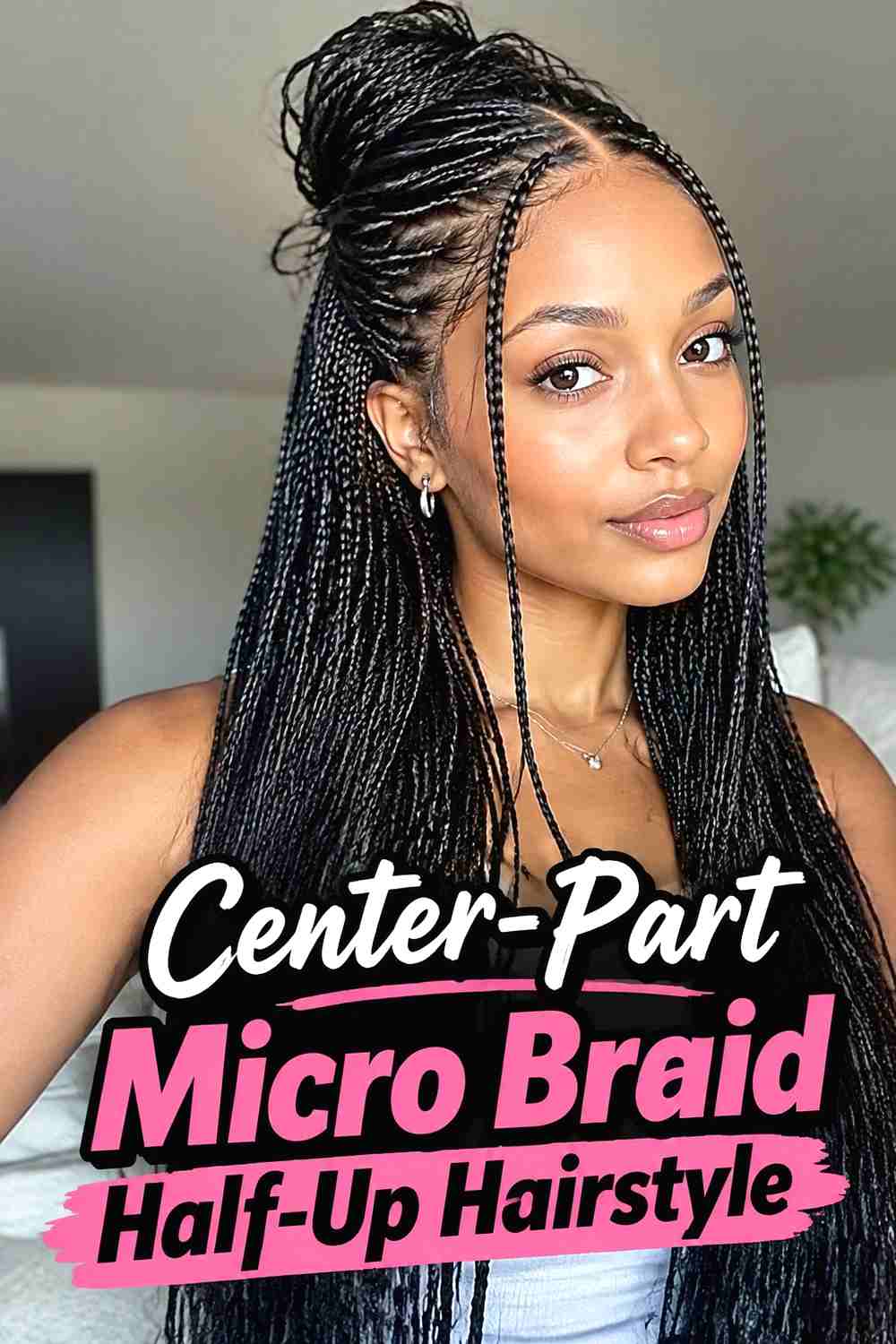 2. Center Part Micro Braid Half Up Hairstyle
