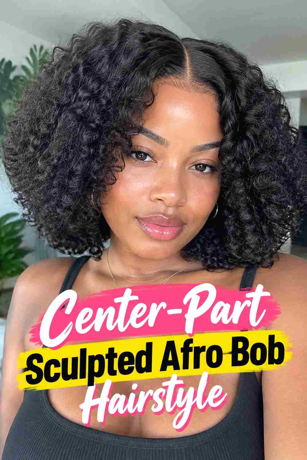 10. Center Part Sculpted Afro Bob Hairstyle