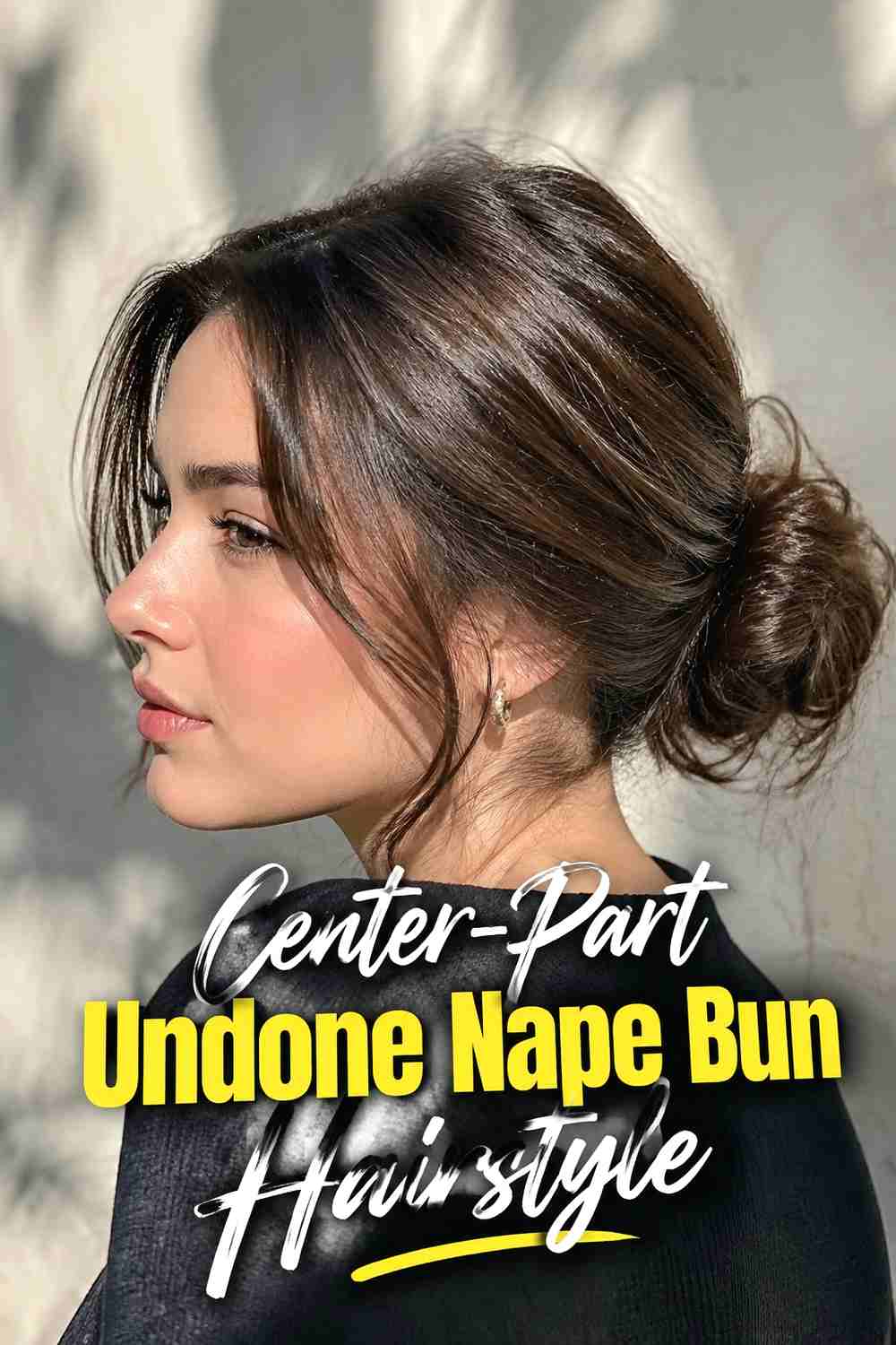 6. Center Part Undone Nape Bun Hairstyle