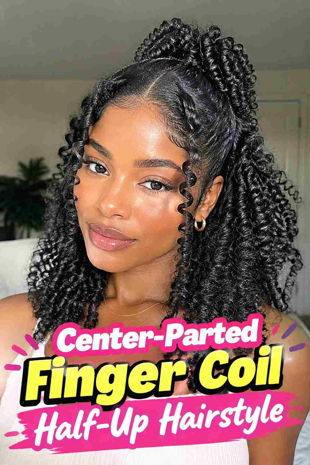 7. Center Parted Finger Coil Half Up Hairstyle