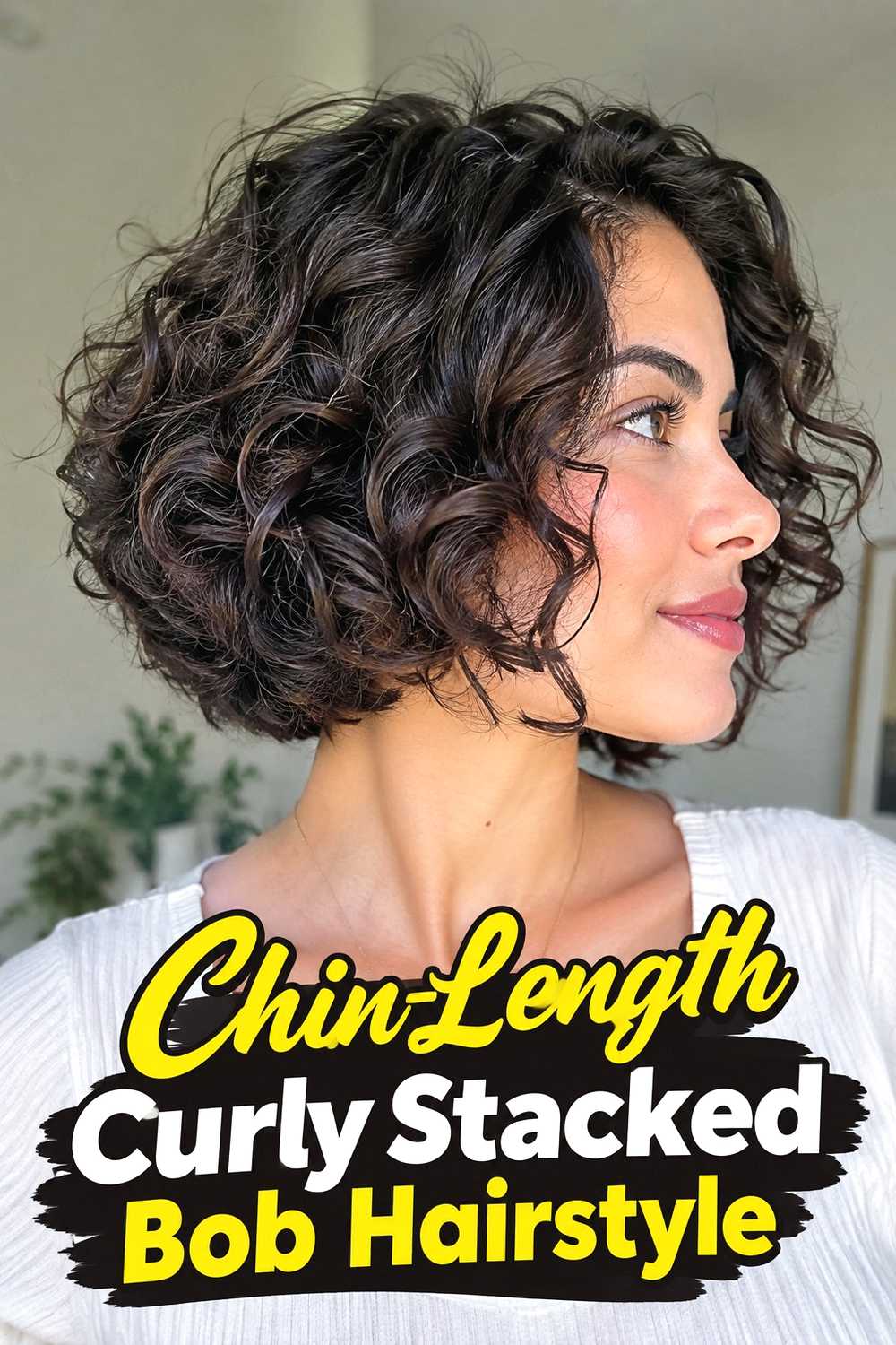 9. Chin Length Curly Stacked Bob Hairstyle