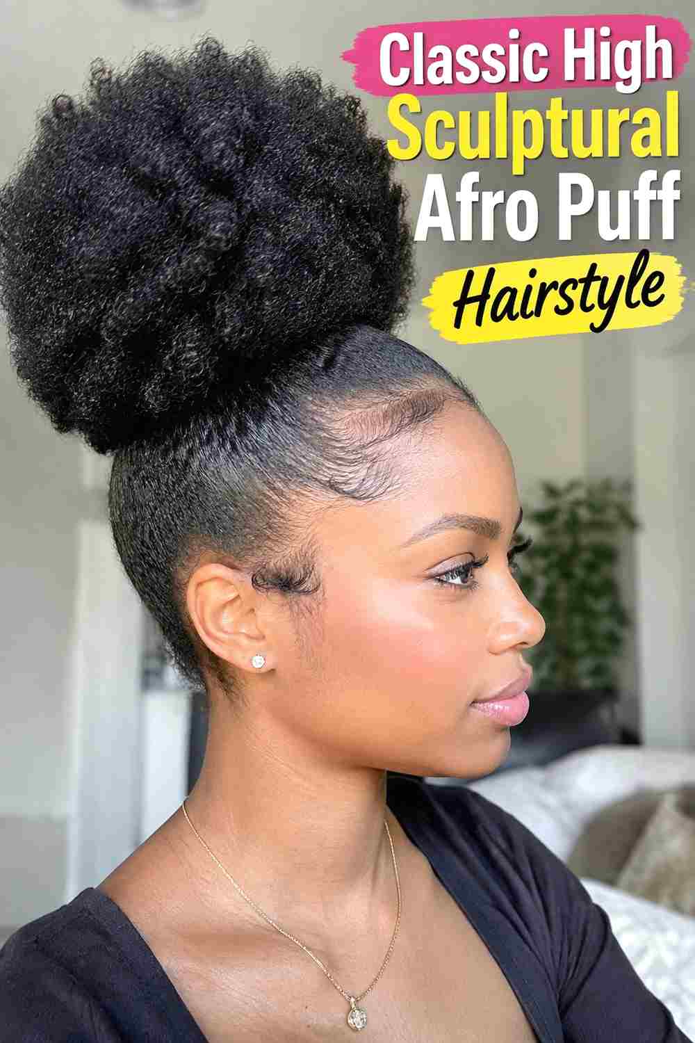 1. Classic High Sculptural Afro Puff Hairstyle