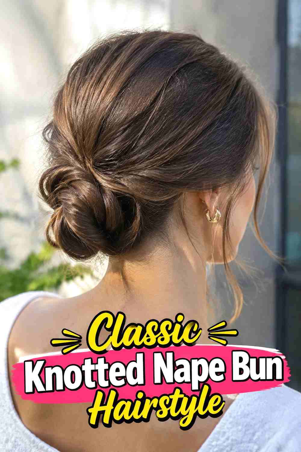 1. Classic Knotted Nape Bun Hairstyle