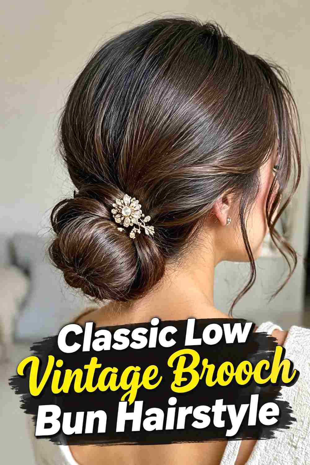 1. Classic Low Vintage Brooch Bun Hairstyle