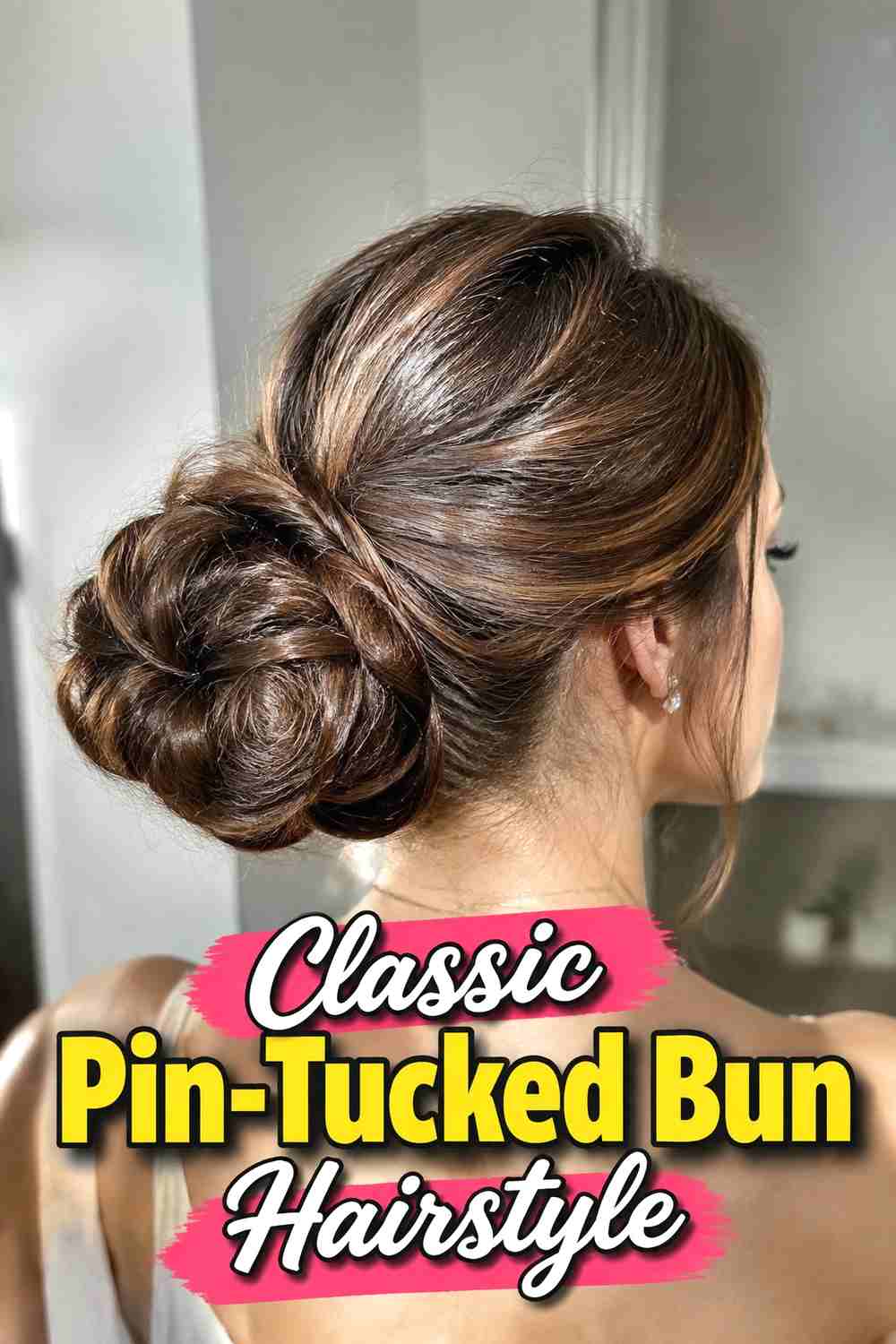 1. Classic Pin Tucked Bun Hairstyle
