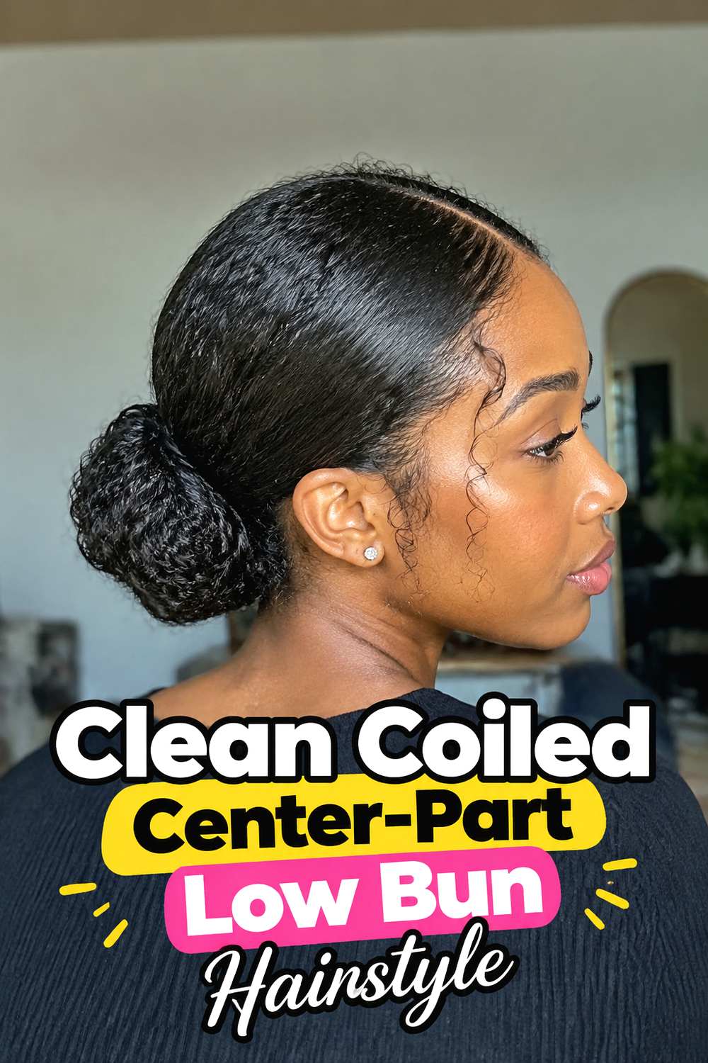 Clean Coiled Center-Part Low Bun Hairstyle