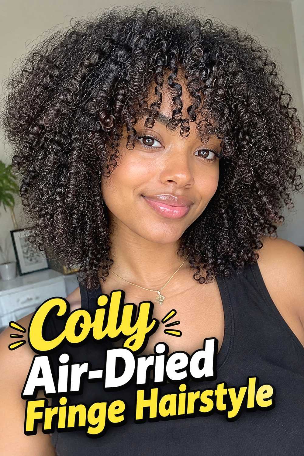 12. Coily Air Dried Fringe Hairstyle