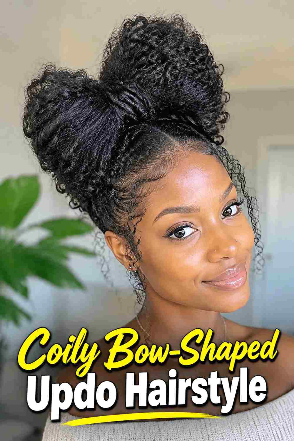 10. Coily Bow Shaped Updo Hairstyle