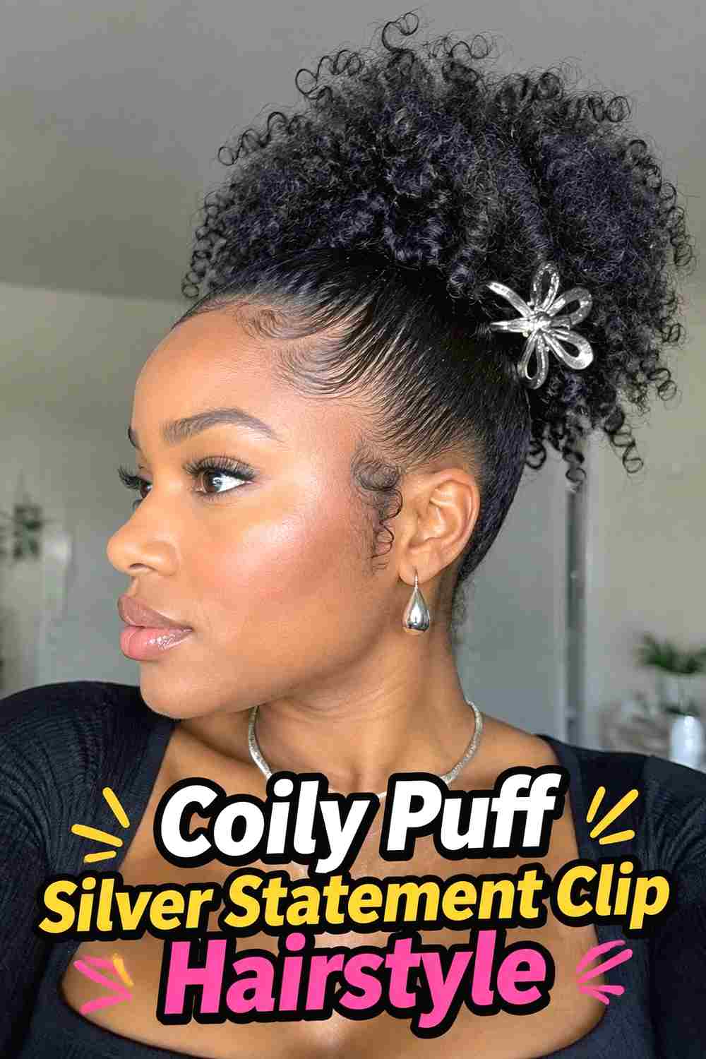 15. Coily Puff Silver Statement Clip Hairstyle