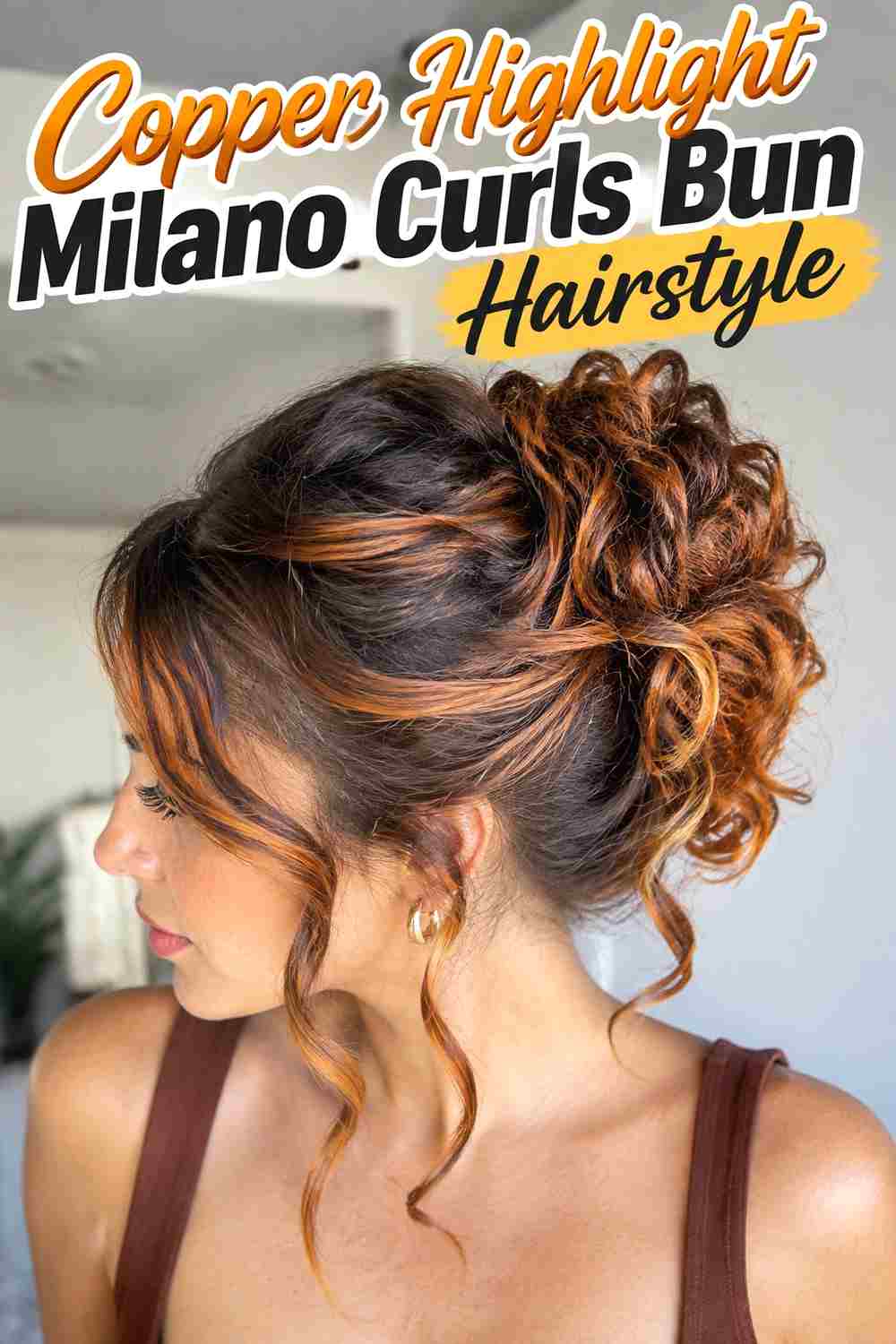 14. Copper Highlight Milano Curls Bun Hairstyle