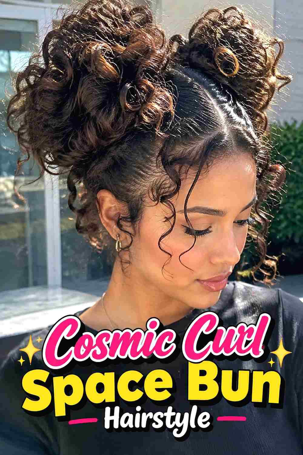 6. Cosmic Curl Space Bun Hairstyle