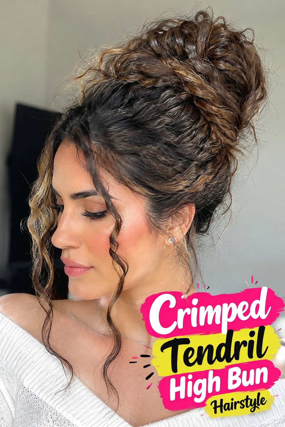 1. Crimped Tendril High Bun Hairstyle