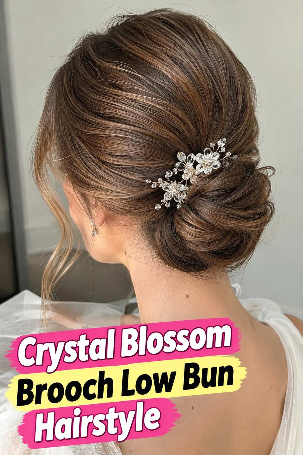 5. Crystal Blossom Brooch Low Bun Hairstyle