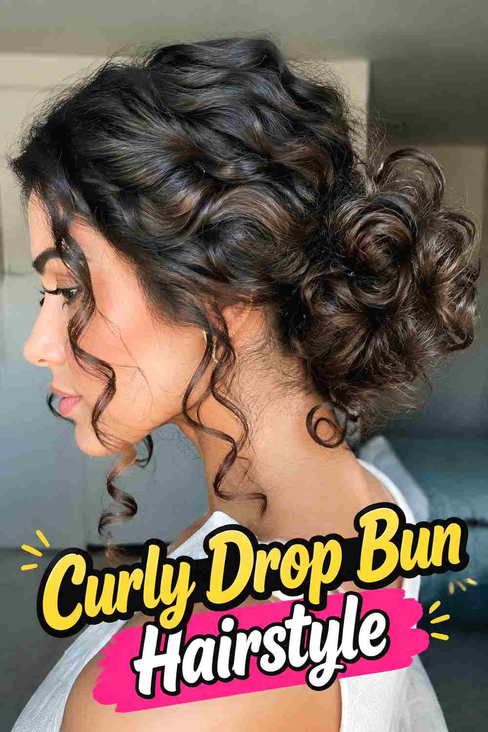 11. Curly Drop Bun Hairstyle