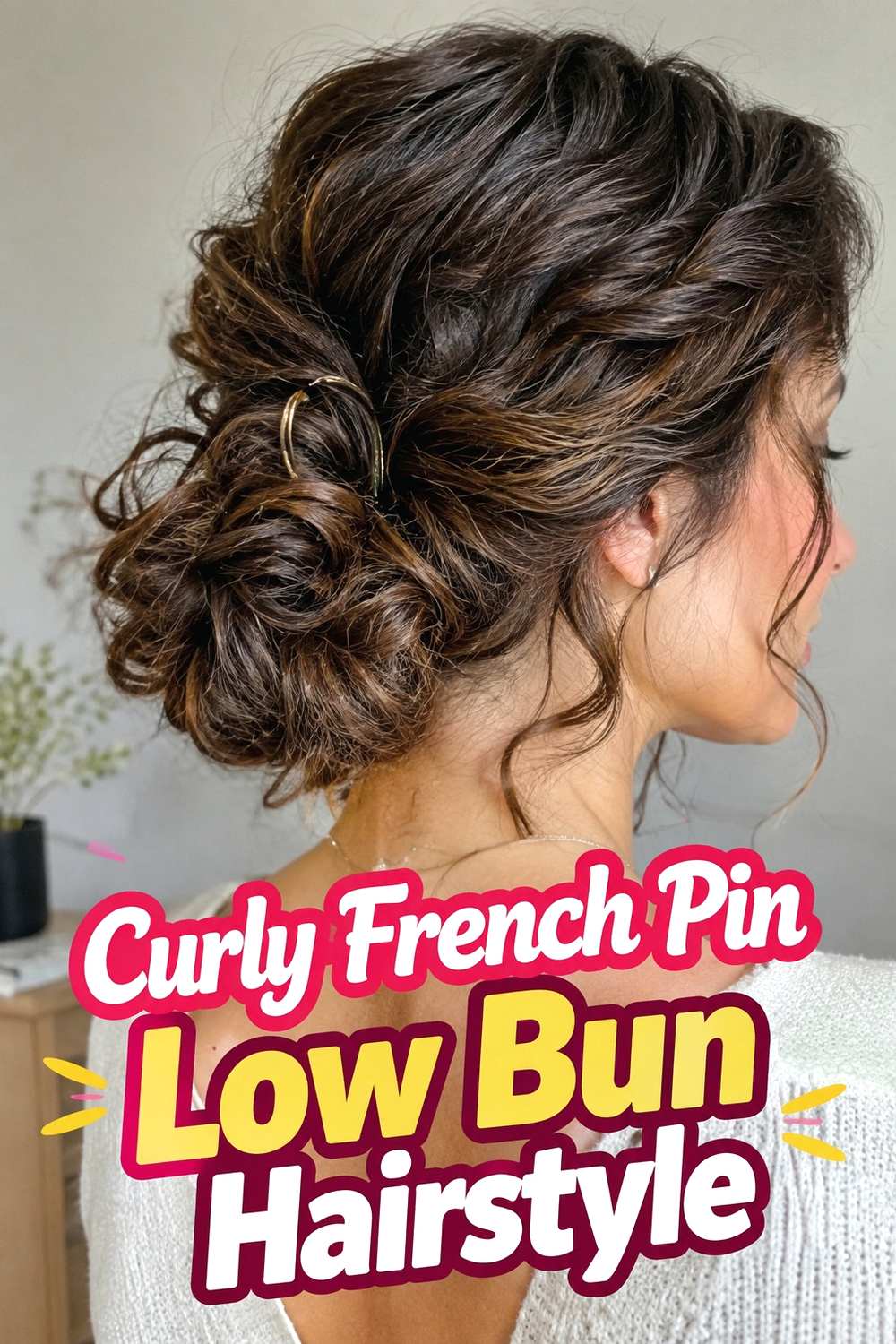 6. Curly French Pin Low Bun Hairstyle