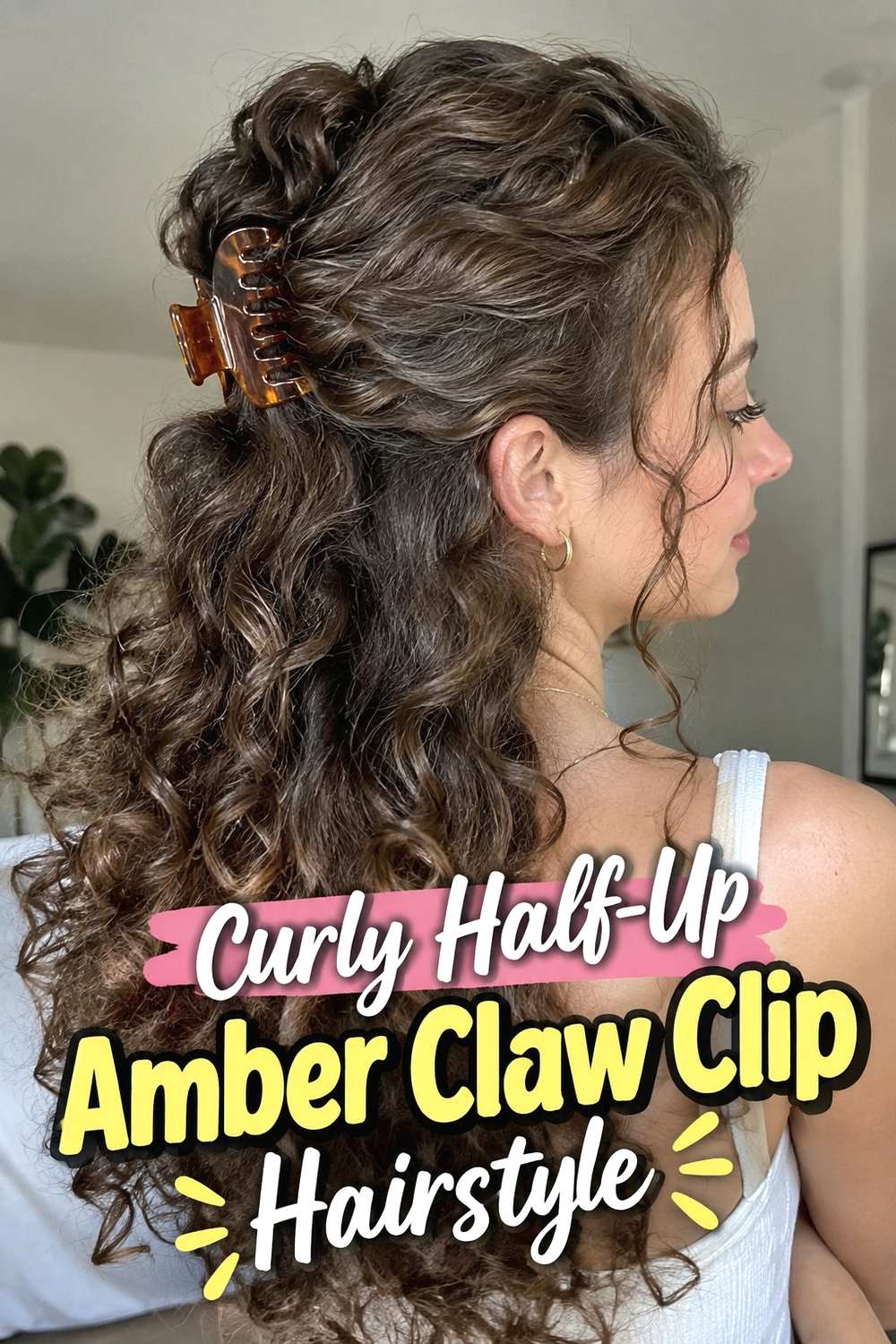 5. Curly Half Up Amber Claw Clip Hairstyle