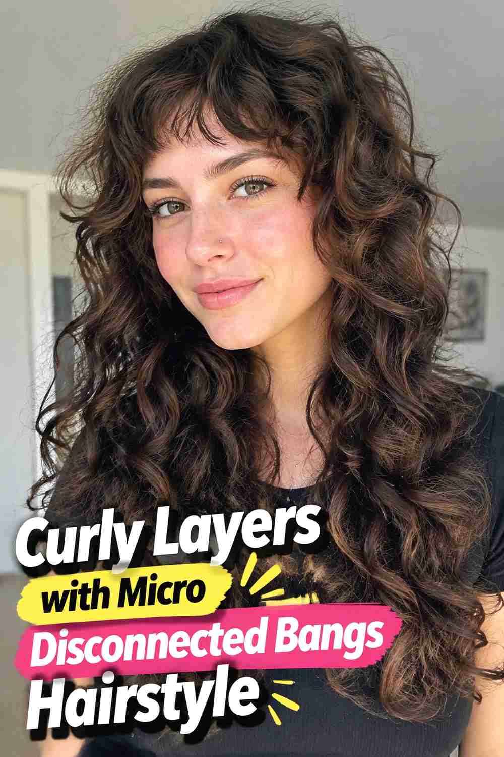 13. Curly Layers With Micro Disconnected Bangs Hairstyle