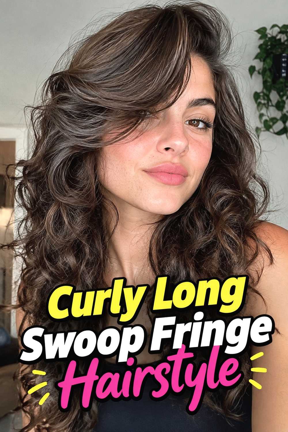 4. Curly Long Swoop Fringe Hairstyle