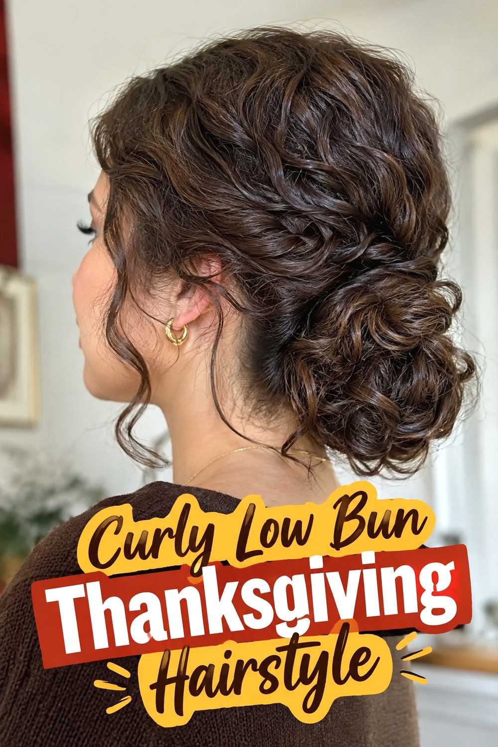 9. Curly Low Bun Thanksgiving Hairstyle
