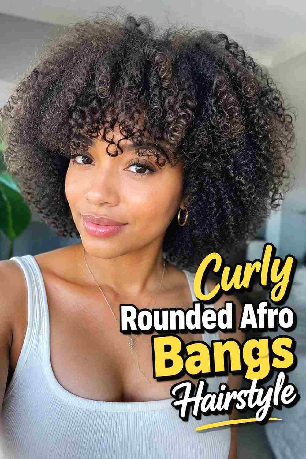 14. Curly Rounded Afro Bangs Hairstyle
