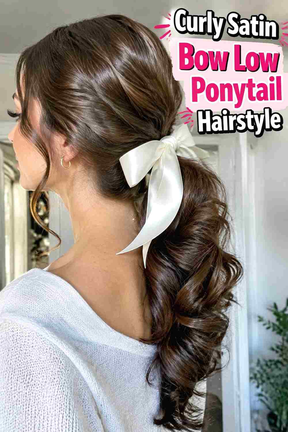 4. Curly Satin Bow Low Ponytail Hairstyle