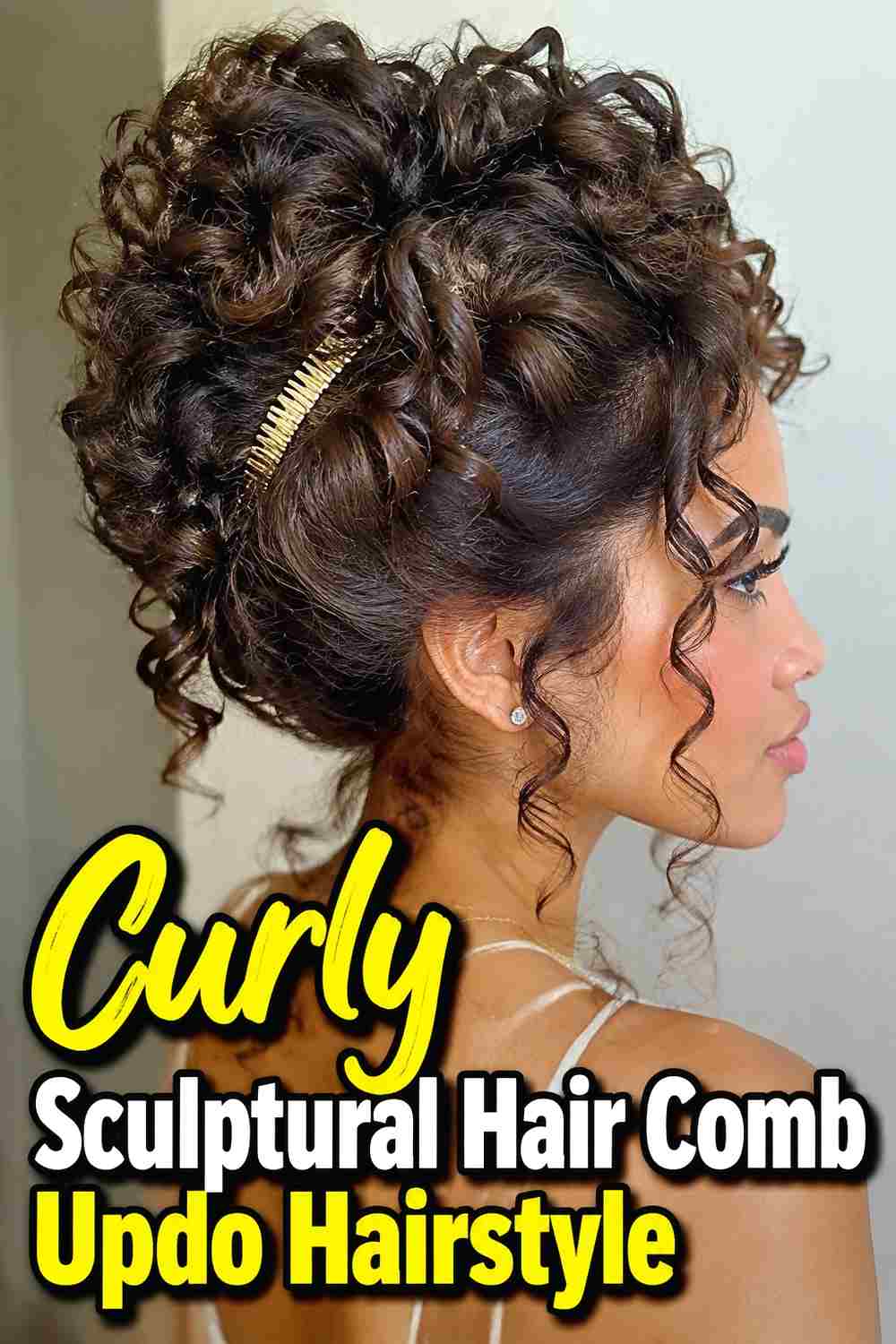 11. Curly Sculptural Hair Comb Updo Hairstyle