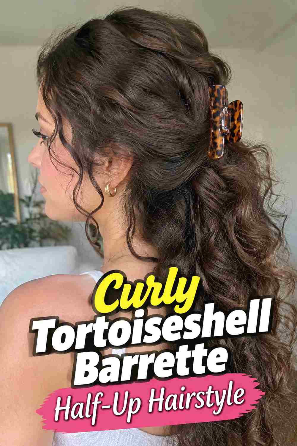 4. Curly Tortoiseshell Barrette Half Up Hairstyle