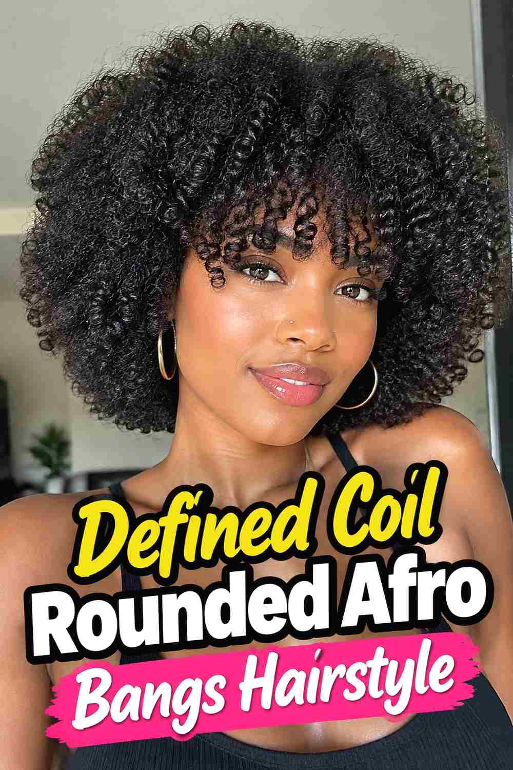 7. Defined Coil Rounded Afro Bangs Hairstyle