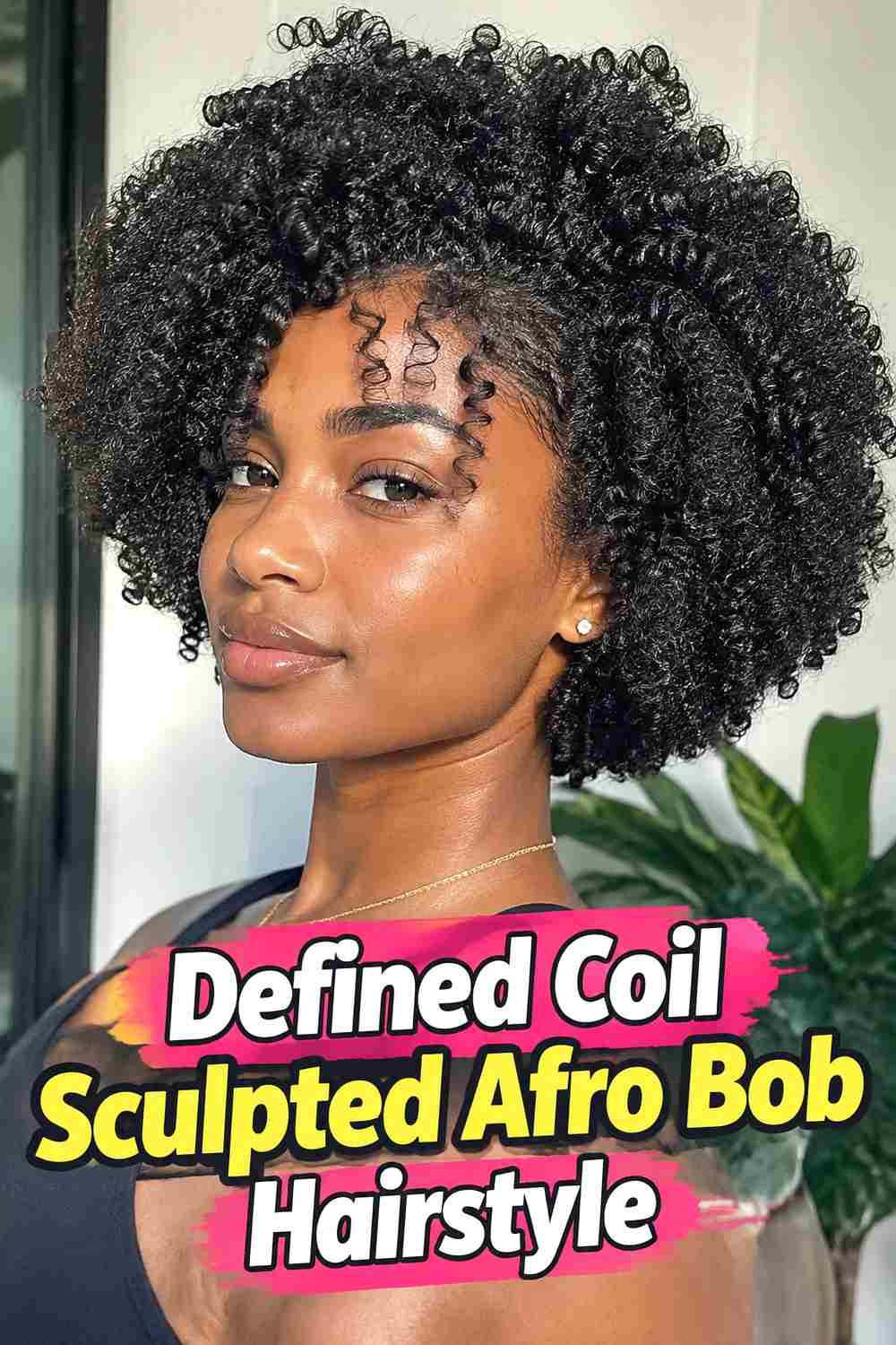 6. Defined Coil Sculpted Afro Bob Hairstyle