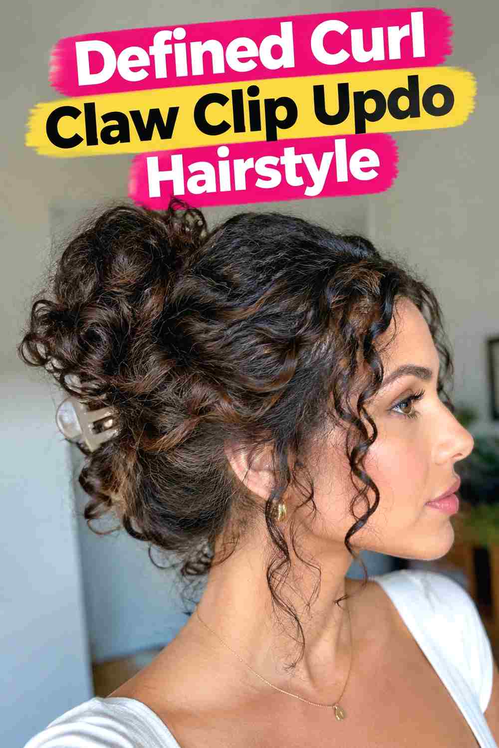 10. Defined Curl Claw Clip Updo Hairstyle